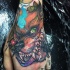 New school style colored hand tattoo of creepy evil monster