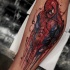 New school style colored leg tattoo of very detailed Spider man