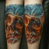 New school style colored leg tattoo of little human skull with trees