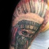 New school style colored shoulder tattoo of Indian skeleton with big helmet
