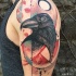 New school style colored shoulder tattoo of crow with ornaments
