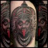 New school style colored tattoo of creepy Hinduism Goddess