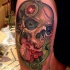 New school style colored thigh tattoo of human skull with jewelry and flowers