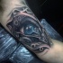 New school style interesting combined colored human eye tattoo on biceps with various mechanical parts