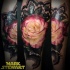 Nice combined and colored arm tattoo of cute rose with ornamental flowers