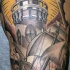 Tatuaggio impressionante sul braccio  il faro costiero & la nave