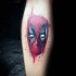 Nice looking colored tattoo of lifelike Deadpool head