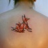 Tatuaggio carino geometrico sulla schiena  la volpe in stile origami