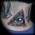 Od school black ink mystical triangle tattoo on neck with birds