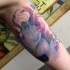 Old Ariel cartoon villain woman tattoo on arm