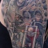 vecchio biker e triste mietitore tatuaggio sulla spalla