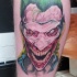 Tatuaje en la pierna,
cara horrorosa de Joker