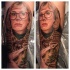 Old fashioned blond middle aged woman in glasses colored portrait tattoo in realism style