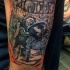Old picture style colored arm tattoo of gladiator with lion
