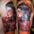 Old school style colored shoulder tattoo of woman with roses