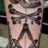 Old school style mystical themed colored cult tattoo on forearm