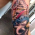 Oldschool Stil nautischthemenorientiertes Bizeps Tattoo von Hai mit Segelschiff