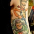 Oldschool Stil farbiges Schulter Tattoo mit Helden aus Toy Story Cartoon