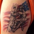 Old school style small shoulder tattoo of American soldier lineman