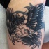 Tatuaje en la pierna,  águila americana enfadada que grita