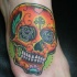 Tatuaje de calavera mexicana en el pie