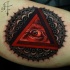 Original combined and colored arm tattoo of triangle with human eye and ornamental flower
