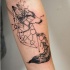 Tatuaje en el antebrazo, zorro exclusivo con figuras geométricas