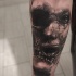 originale combinazione faccia meta mostro meta cranio tatuaggio su coscia