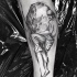 Dipinto da Inez Janiak tattoo of man with big rock