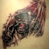 pantera nera da sotto pelle tatuaggio sulla scapola