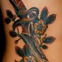 Tatuaje  de daga con flores, patchwork