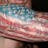 Patriotic american flag tattoo on arm
