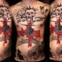 Photoshop Stil schwarzes Tattoo an ganzer Brust mit rotem Kreuz mit Hubschrauber und Schriftzug