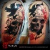 Photoshop style colored shoulder tattoo of human skull with clock and crow
