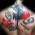 Photoshop style colored upper back tattoo of lettering with various pictures
