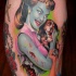 Tatuaje  de mujer zombi con perrito
