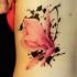 Pink colored back tattoo of sweet flower