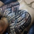 Polynesian style ornaments tattoo on chest