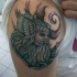 Tatuaje en el brazo, retrato de vikingo