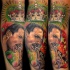 Portrait style colored arm tattoo of Queen with crown