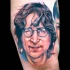Portrait style colored Aron Lennon face tattoo