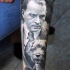 Portrait style colored forearm tattoo of man with little dog