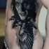 Portrait style detailed side tattoo of Crow hero with flying bird