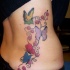 bellissime farfalle tatuaggio per donna su costolette