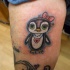 Tatuaje  de pingüino de dibujos animados
