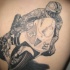 corridore su moto sportivo tatuaggio