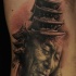Real life style detailed praying old Asian monk tattoo on side combined with big temple