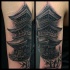 Real photo like black and white shoulder tattoo of antic Asian temple and bamboo