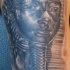 Real photo like black ink Egypt pharaoh statue tattoo
