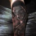 Real photo style black and white leg tattoo of angry fighting Hulk